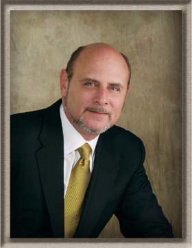 kirk donovan enterprises | Kirk Donovan Enterprises Kirk Donovan, founder of Kirk Donovan Enterprises, in a dark suit and gold tie