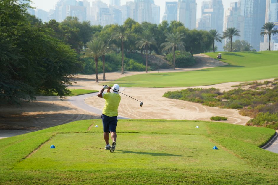 Professional services | Premier Private Rides Cusseta Resort Golfer tees up golf ball