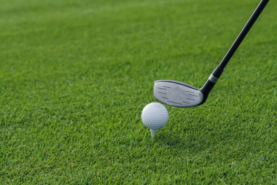 Lilburn Resort Golfer tees up golf ball